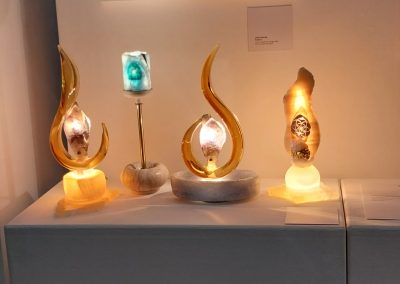 Honey comb Calcite, Amethyst, glass flame. Larimar, brown Travertinte, Flower of Life. Celestite, Amethyst, glass flame, Fruit of Life symbol Yellow Onyx flame on Yellow Calcite, Seed of Life symbol